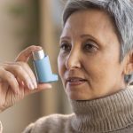 Is there help for people who have trouble breathing? 7 senior woman holding asthma inhaler